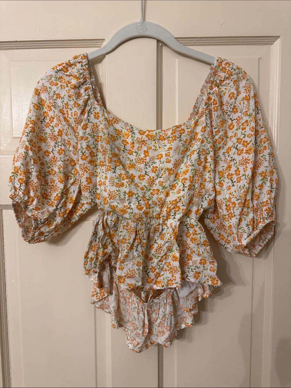 Lush White Floral Puff-Sleeve Peplum Blouse with Orange Blooms